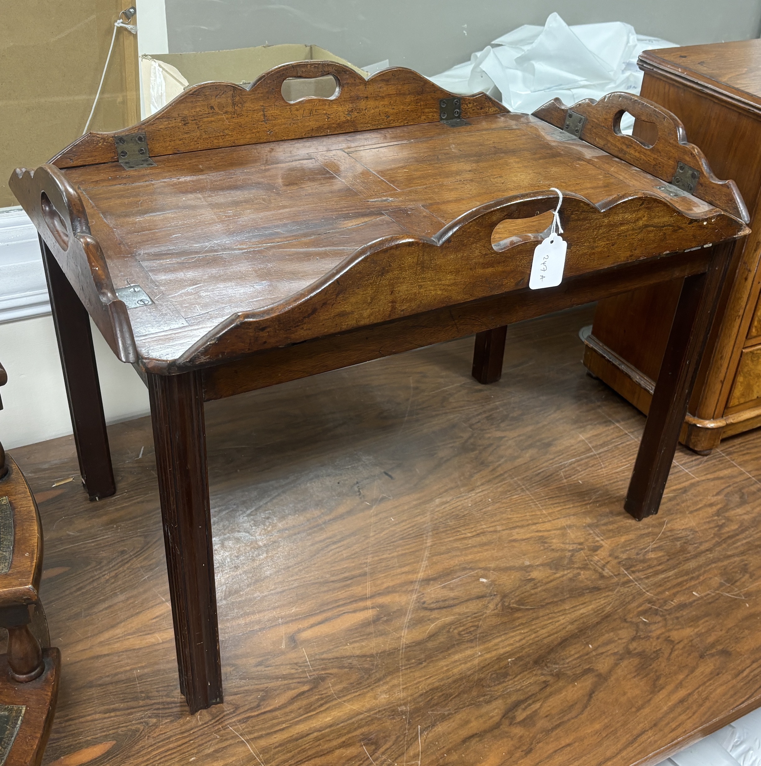 A 19th century mahogany rectangular butler's tray on associated stand, width 72cm, depth 47cm, height 53cm